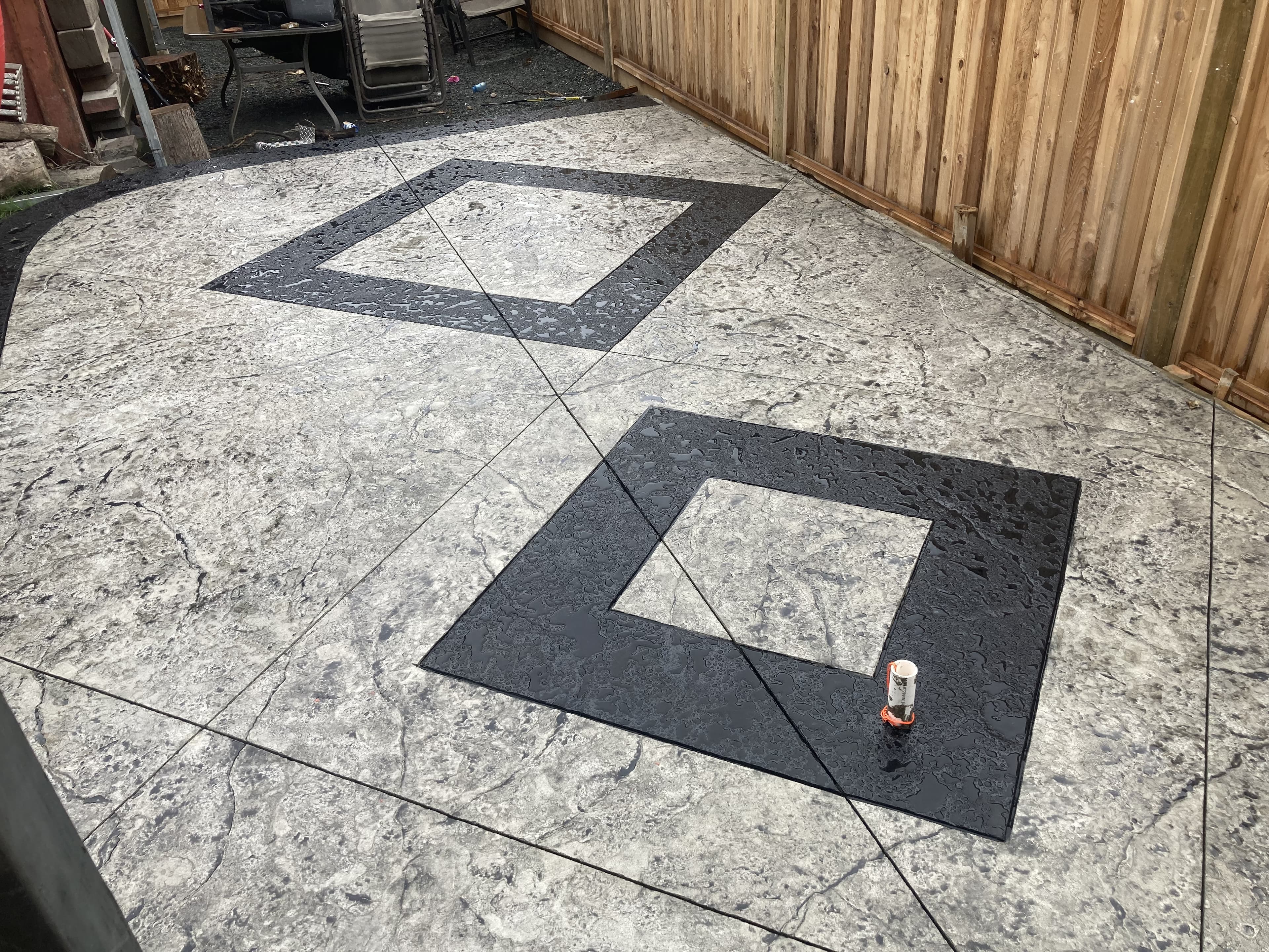 Diamond-inlay decorative concrete finished near Innisfail, Alberta by JFK Surfaces