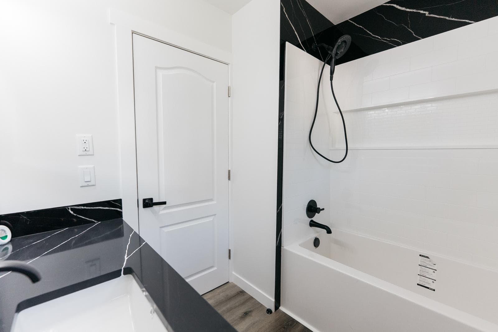 White subway tile tub surround — JFK Surfaces project in Central Alberta