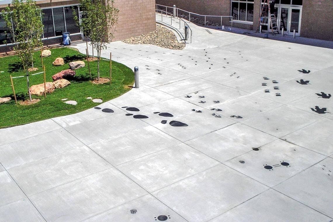 Custom decorative pattern engraved into plain concrete
