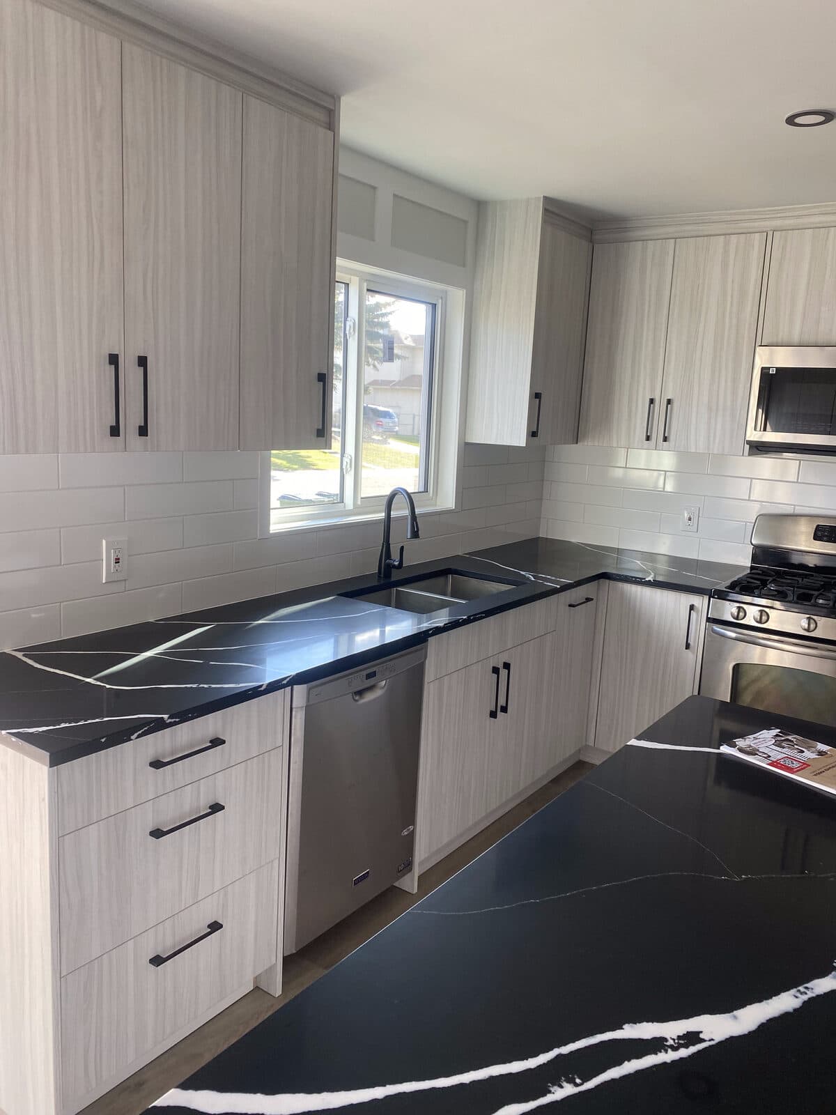 Modern white shaker kitchen — JFK Surfaces project in Central Alberta
