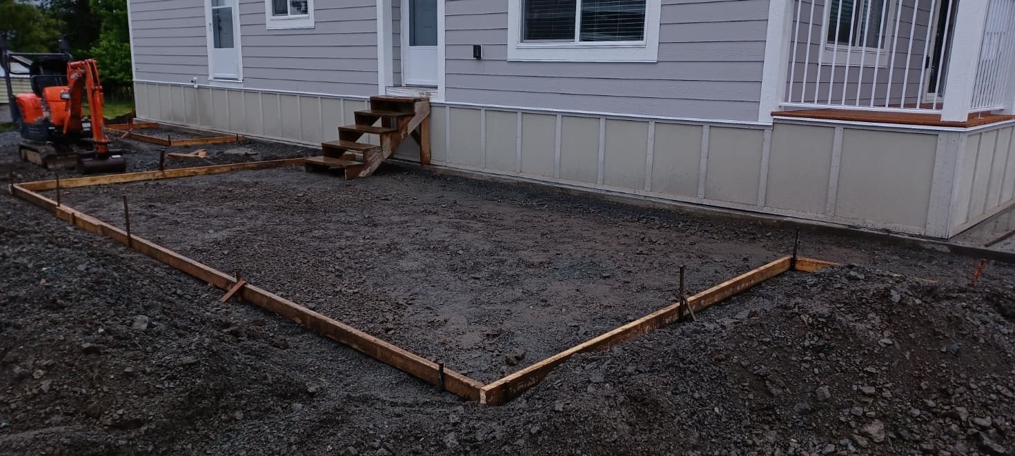 Concrete forms and base prep on a rural acreage property in Central Alberta by JFK Surfaces